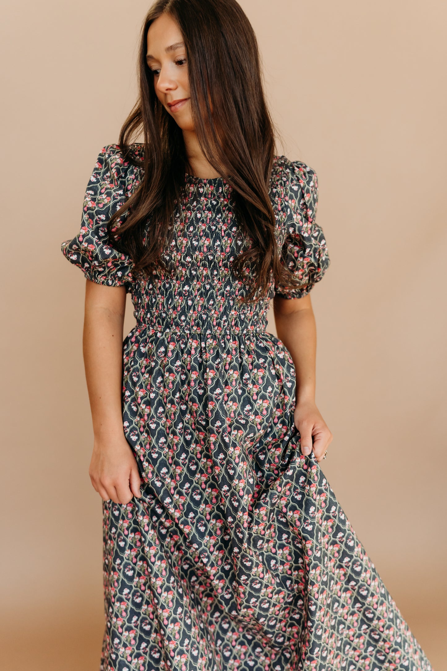 THE MAXINE SMOCKED FLORAL MAXI IN BLACK