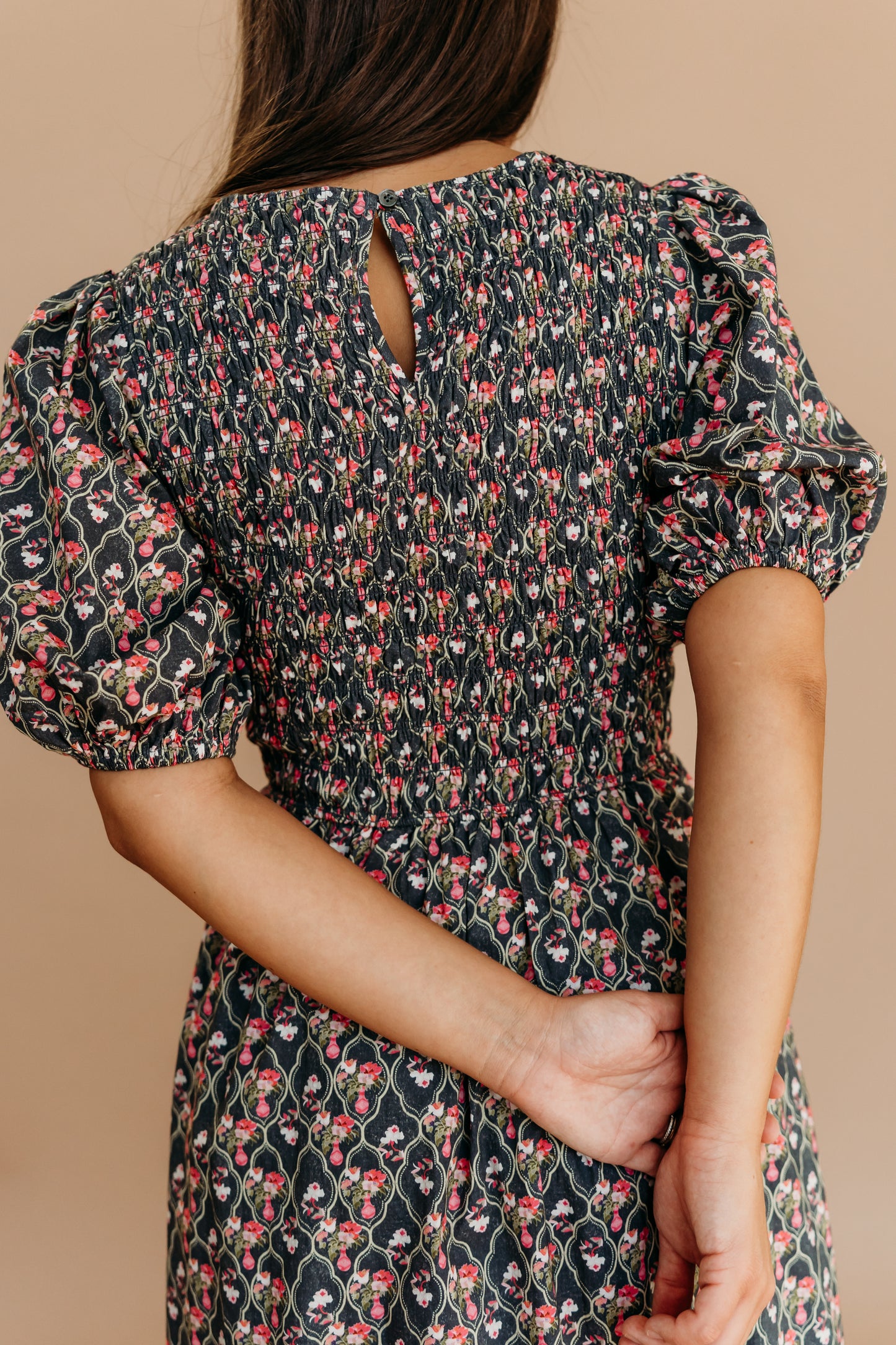 THE MAXINE SMOCKED FLORAL MAXI IN BLACK