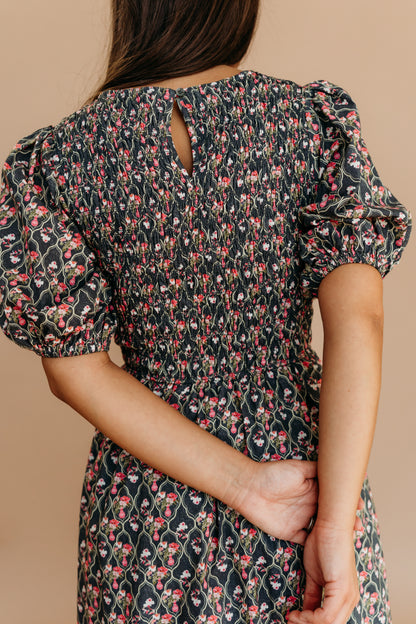 THE MAXINE SMOCKED FLORAL MAXI IN BLACK