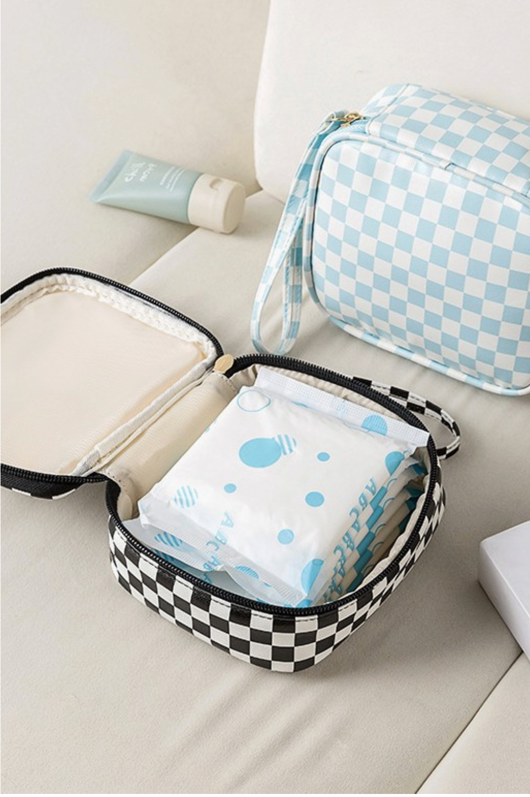 THE CHECKER COSMETIC TRAVEL BAG