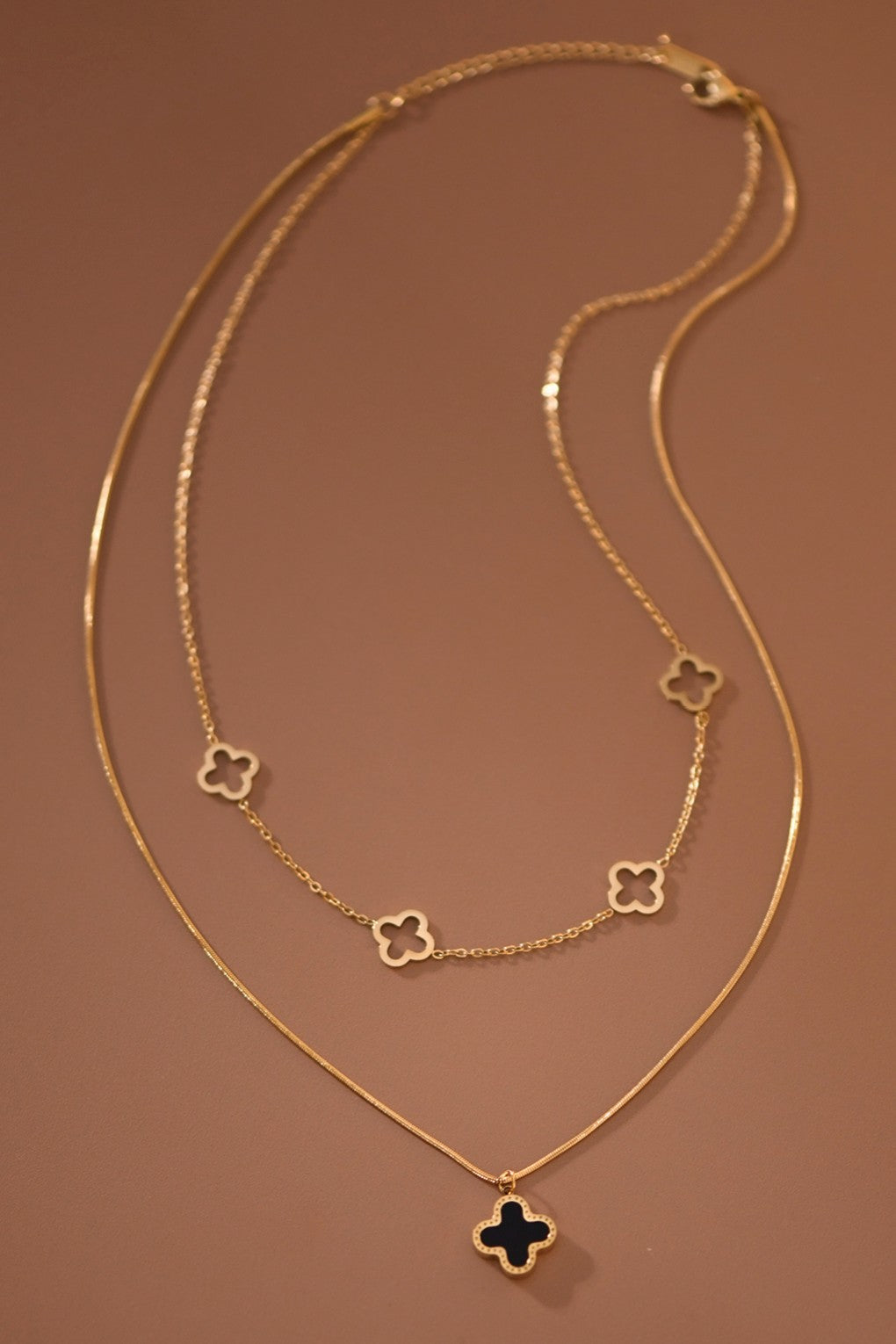 THE DOUBLE SIDED CLOVER NECKLACE