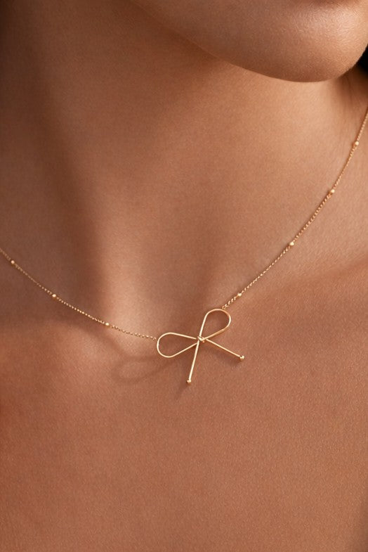THE GOLDEN BOW TIED NECKLACE