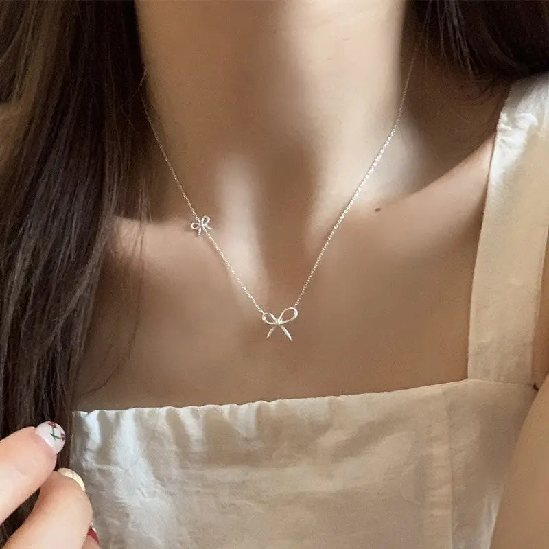 THE SILVER BOW LAYERED NECKLACE