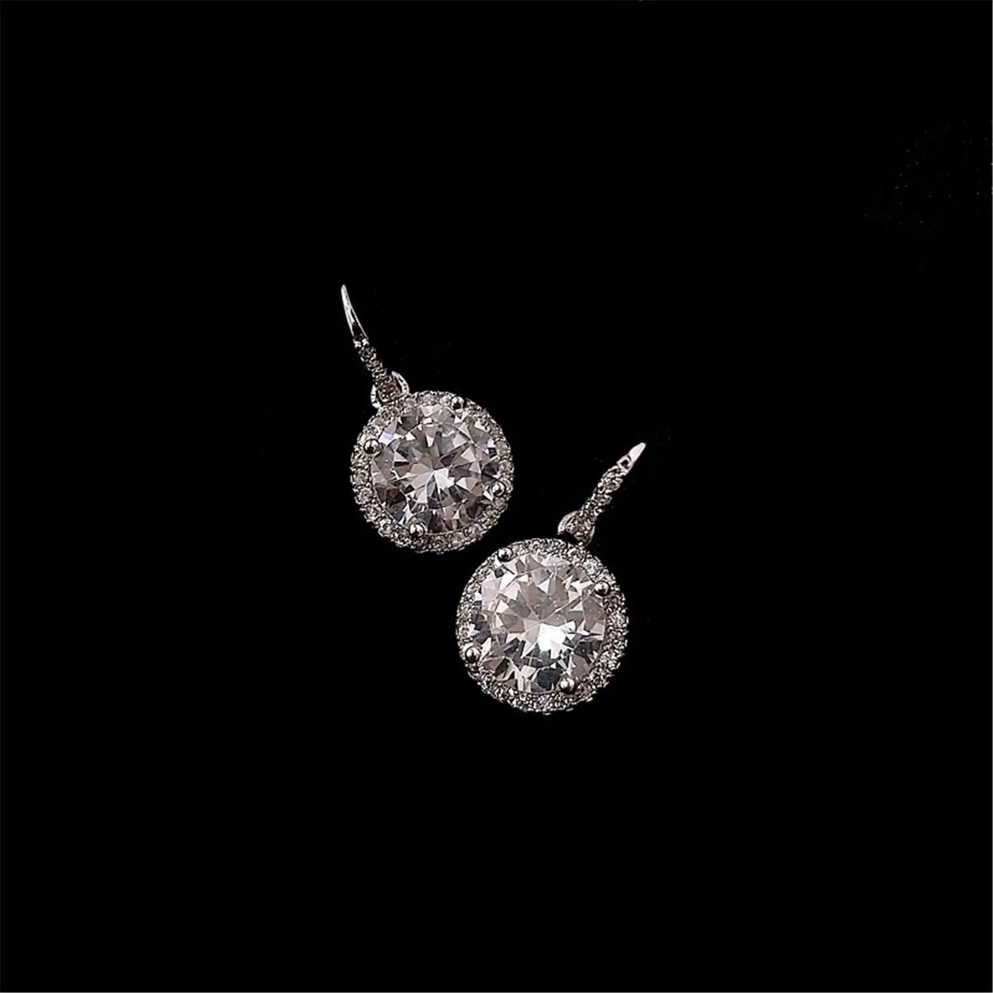THE CELESTIAL SPARK DROP EARRINGS