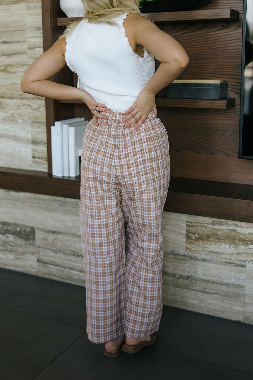 THE KIARA PLAID WIDE LEG PANTS IN BROWN