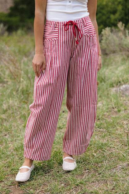 THE LENI STRIPED BARREL DENIM PANTS IN RED