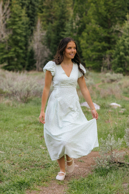 THE ANNABELLE DITSY FLORAL FLUTTER SLEEVE DRESS