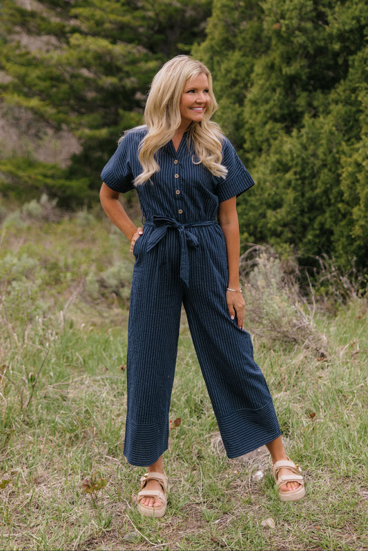 THE EMBER STRIPE JUMPSUIT IN NAVY