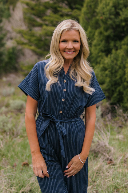 THE EMBER STRIPE JUMPSUIT IN NAVY