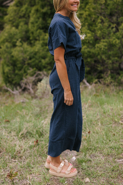 THE EMBER STRIPE JUMPSUIT IN NAVY