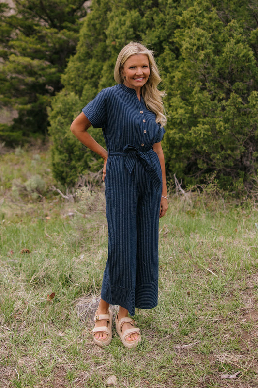 THE EMBER STRIPE JUMPSUIT IN NAVY