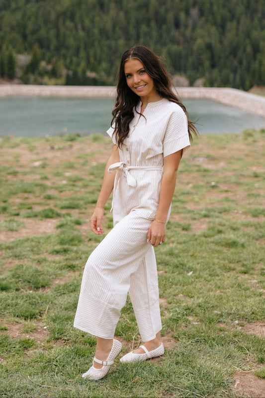 THE EMBER STRIPE JUMPSUIT IN OATMEAL
