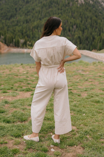 THE EMBER STRIPE JUMPSUIT IN OATMEAL