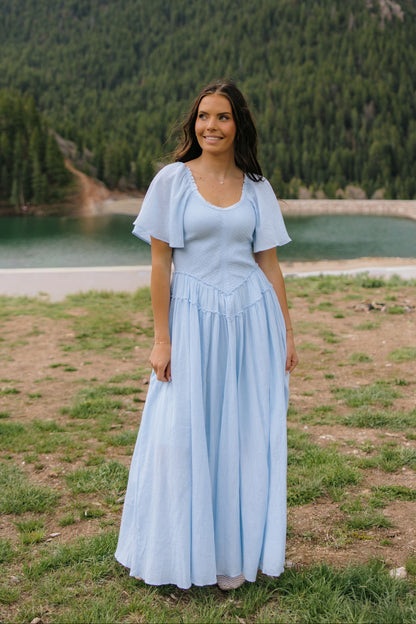 THE AMBER SMOCKED MAXI DRESS IN BLUE