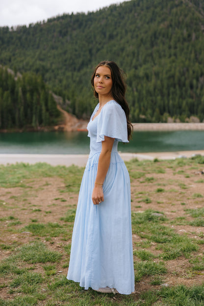 THE AMBER SMOCKED MAXI DRESS IN BLUE
