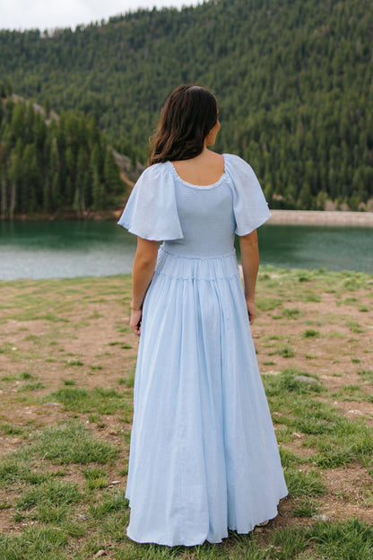 THE AMBER SMOCKED MAXI DRESS IN BLUE