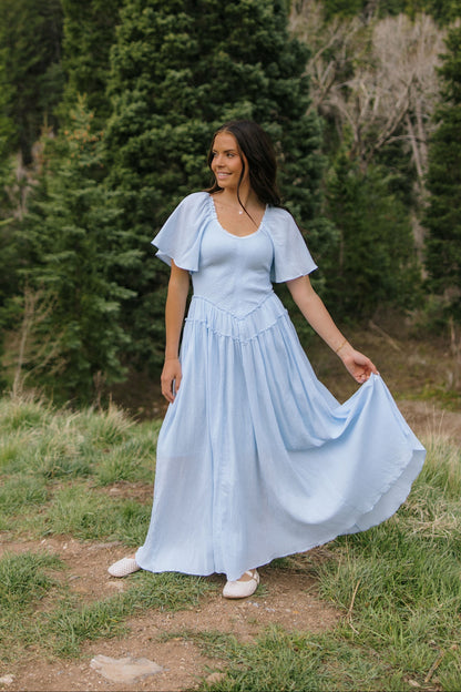 THE AMBER SMOCKED MAXI DRESS IN BLUE