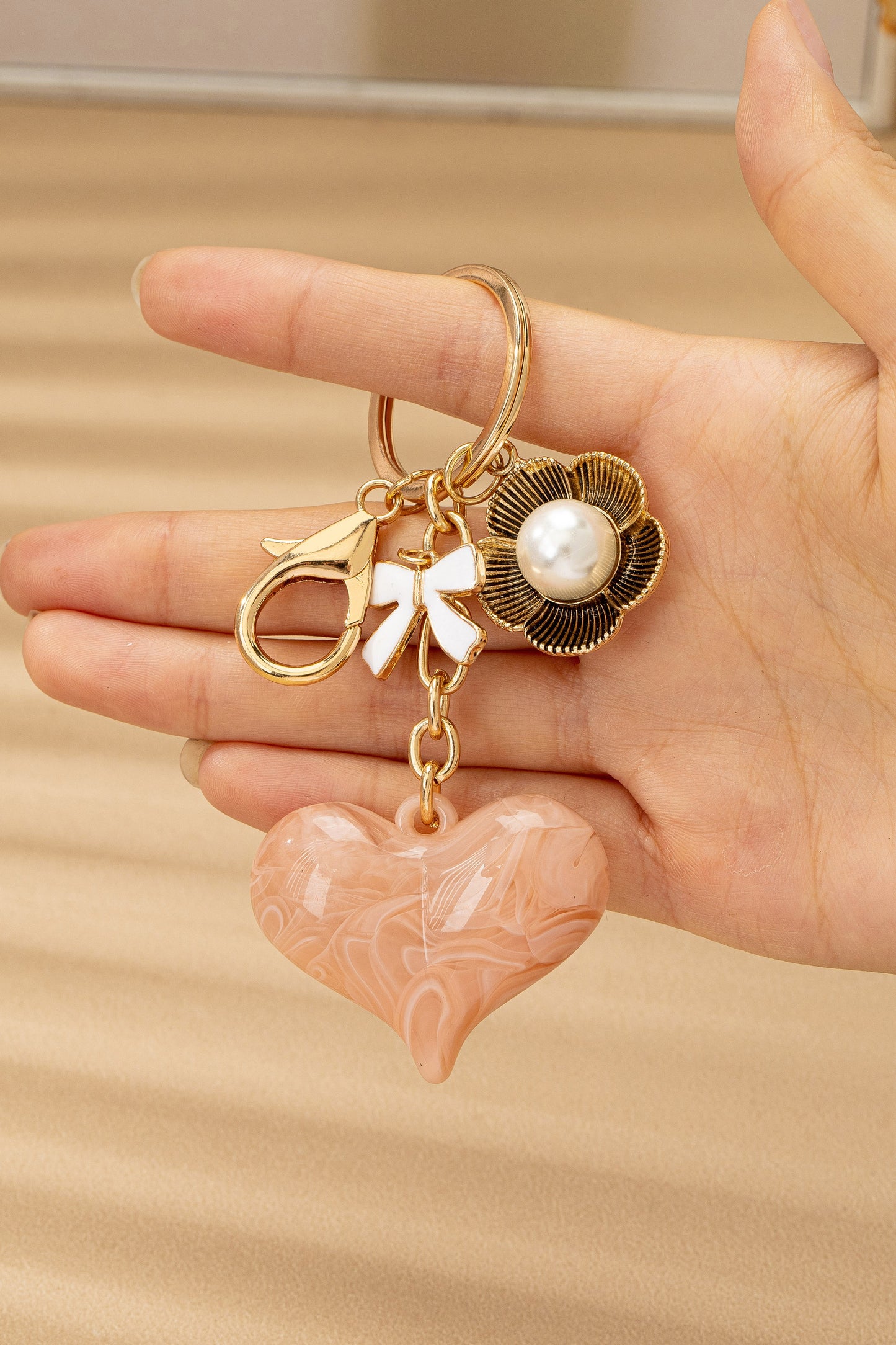 THE SWIRL HEART BAG CHARM