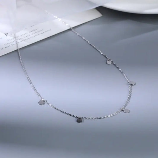 THE SILVER CHARM DROP NECKLACE