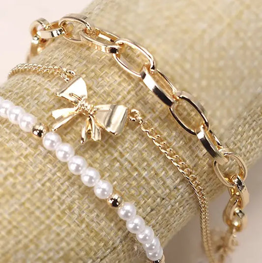 THE CHARMED BOW BRACELET SET