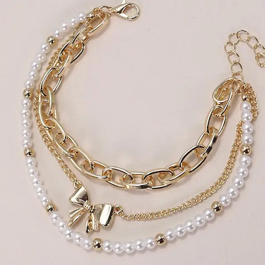 THE CHARMED BOW BRACELET SET