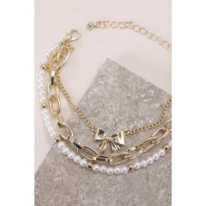 THE CHARMED BOW BRACELET SET