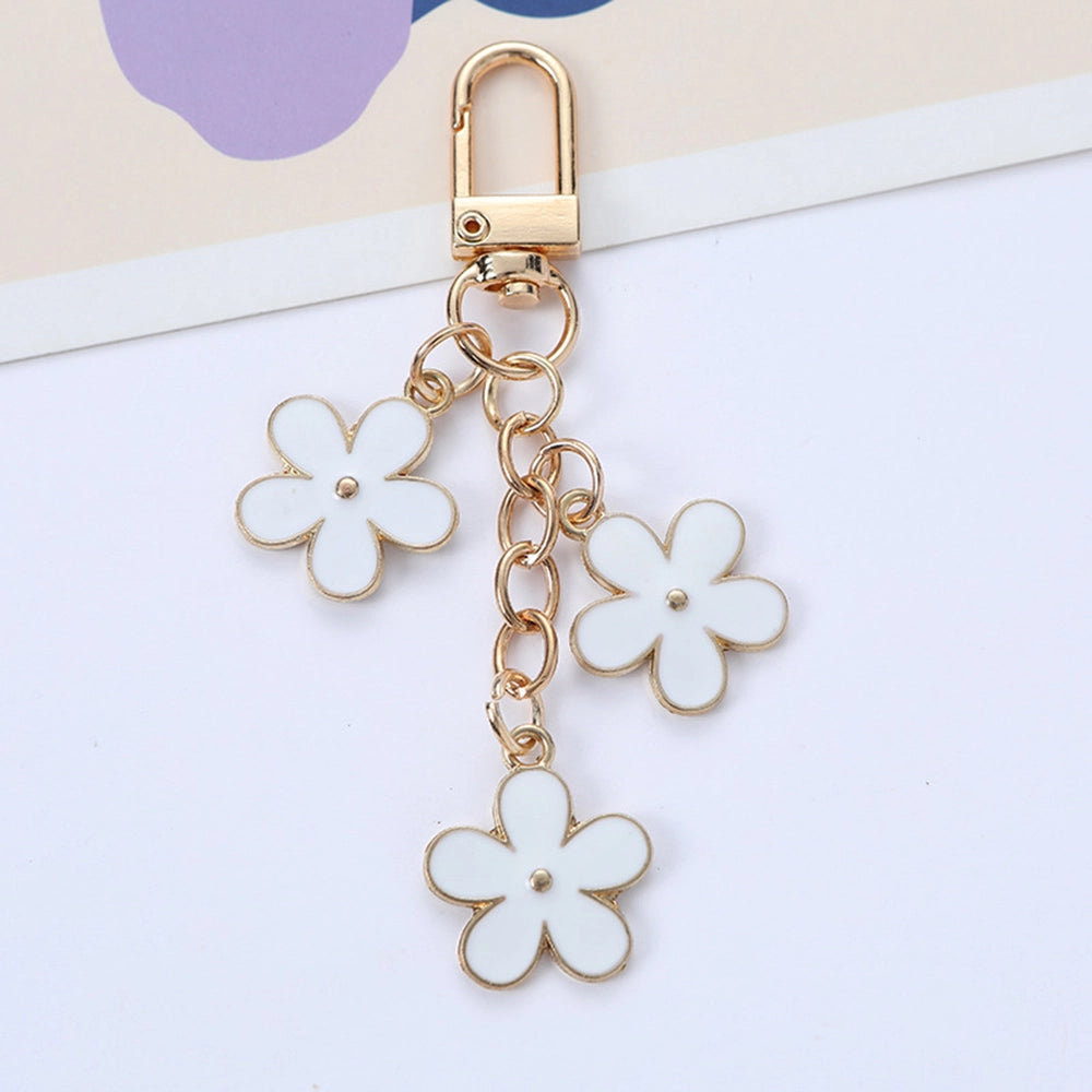 THE TRIPLE FLOWER BAG CHARM