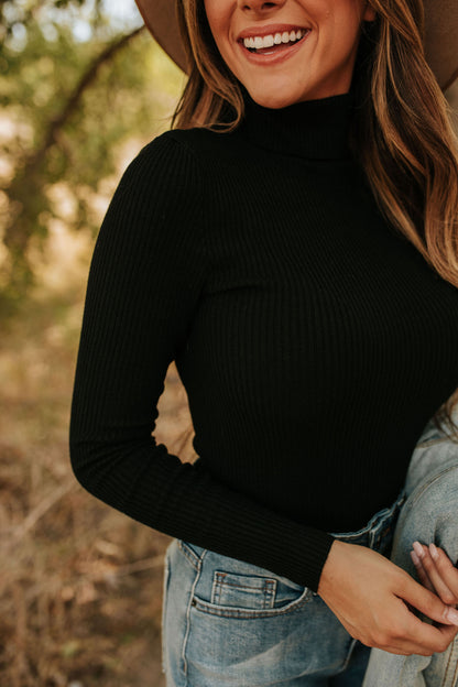 THE LONDON TURTLENECK RIBBED SWEATER IN BLACK