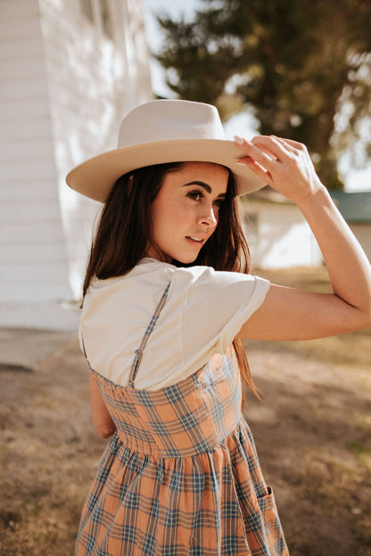 THE LET'S GO PLAID MIDI DRESS IN PEACH AND NAVY