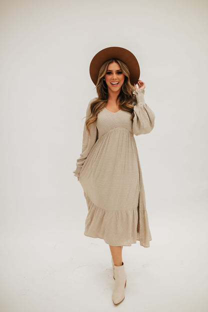 THE SCOUT SMOCKED SWISS DOT MIDI DRESS IN SAND