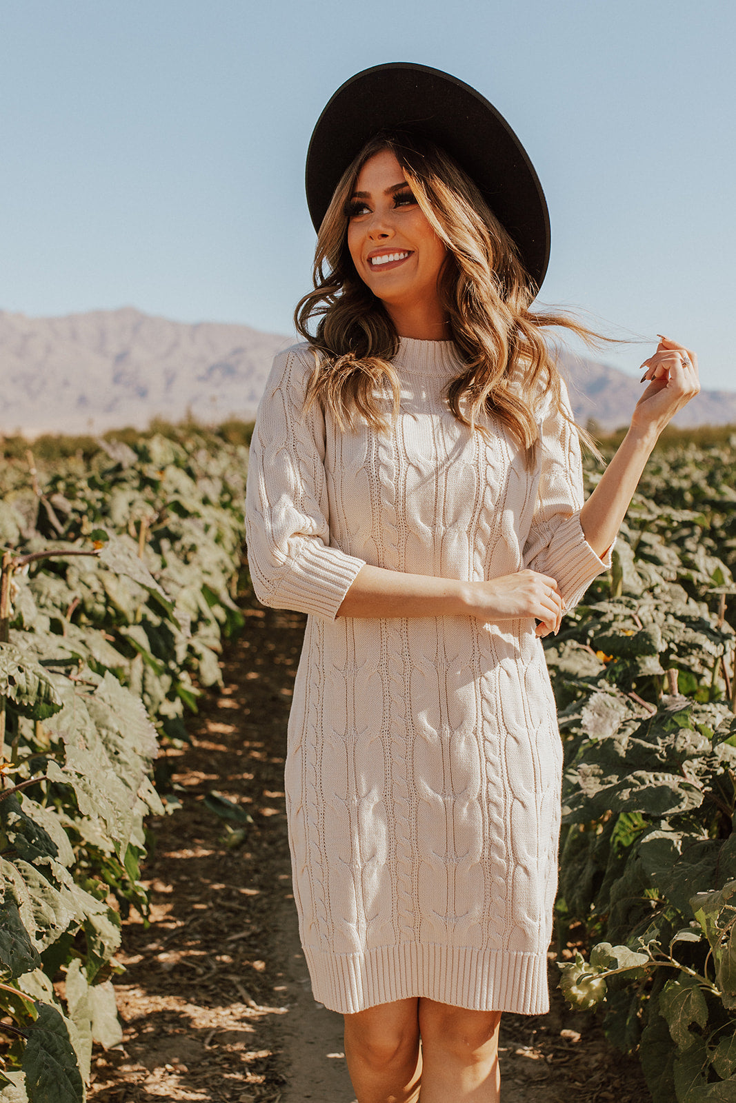 THE SWEATER WEATHER CABLE KNIT DRESS IN IVORY BY PINK DESERT