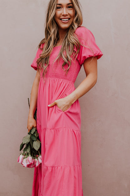 THE SWEET KISS SMOCKED MAXI DRESS IN TAFFY PINK BY PINK DESERT