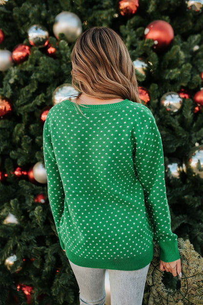 THE CHRISTMAS REINDEER SWEATER IN HOLLY GREEN