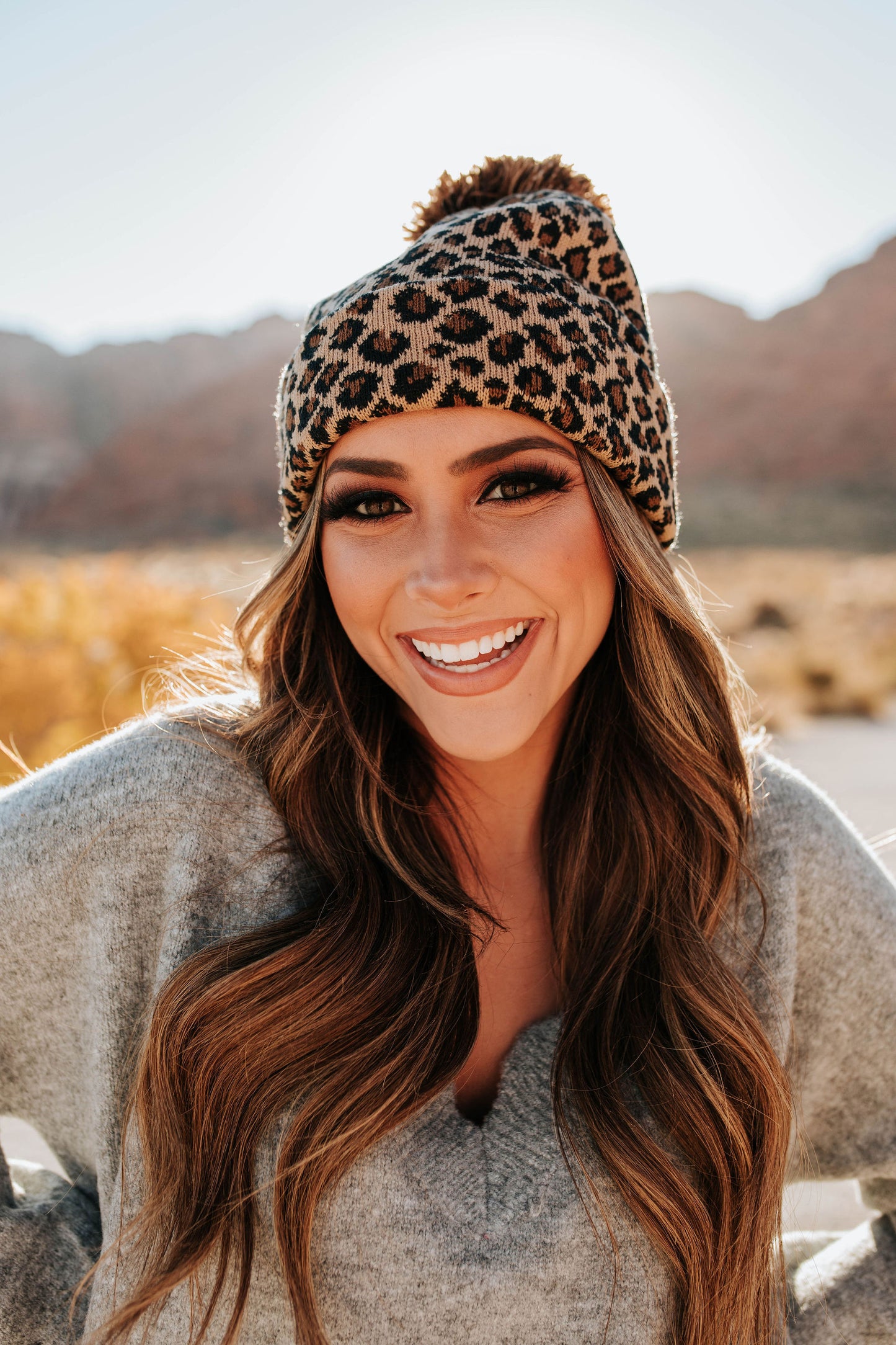 THE LEOPARD POM BEANIE IN BROWN