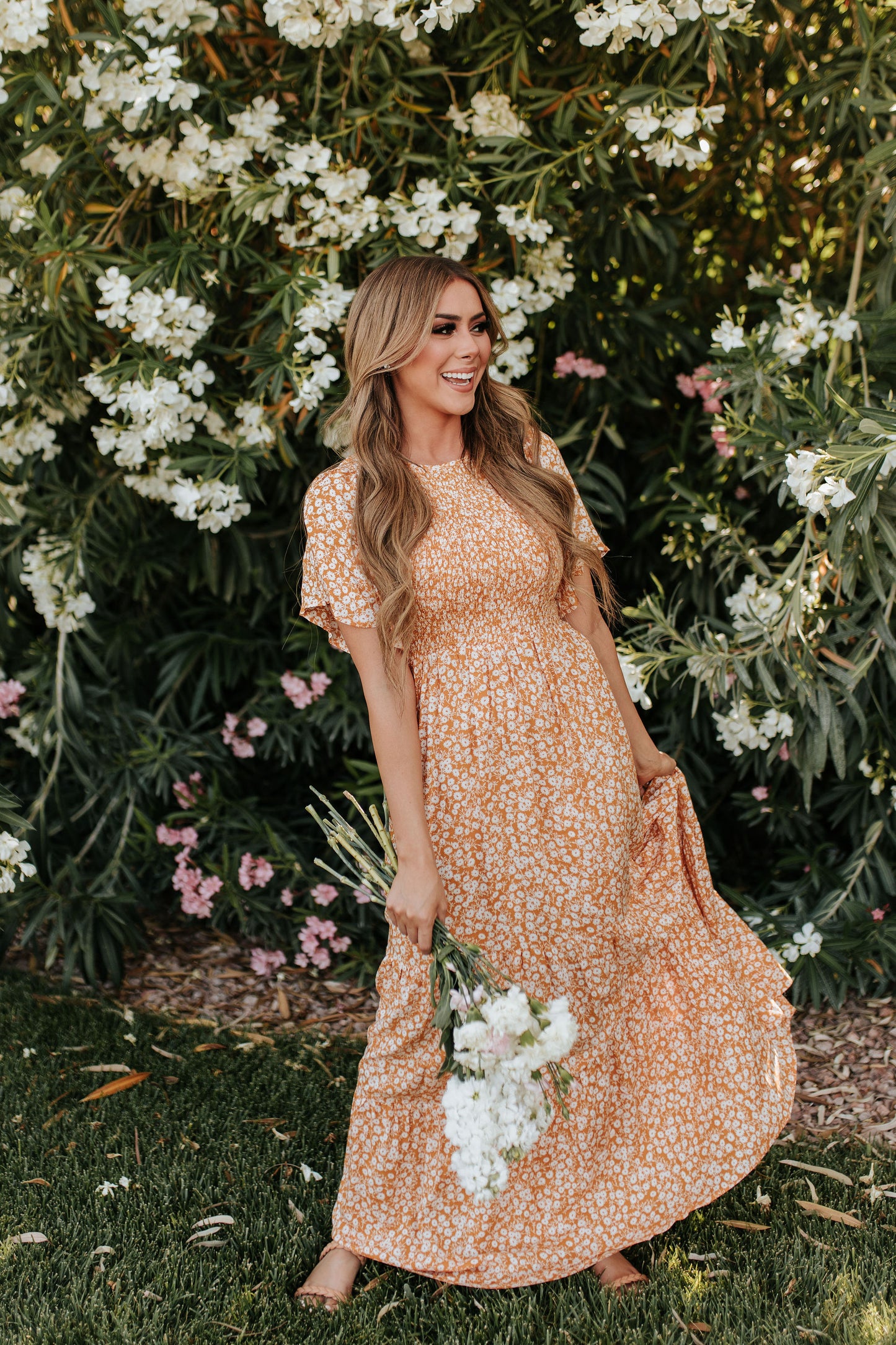 THE ESTELLE SMOCKED MAXI DRESS IN MARIGOLD