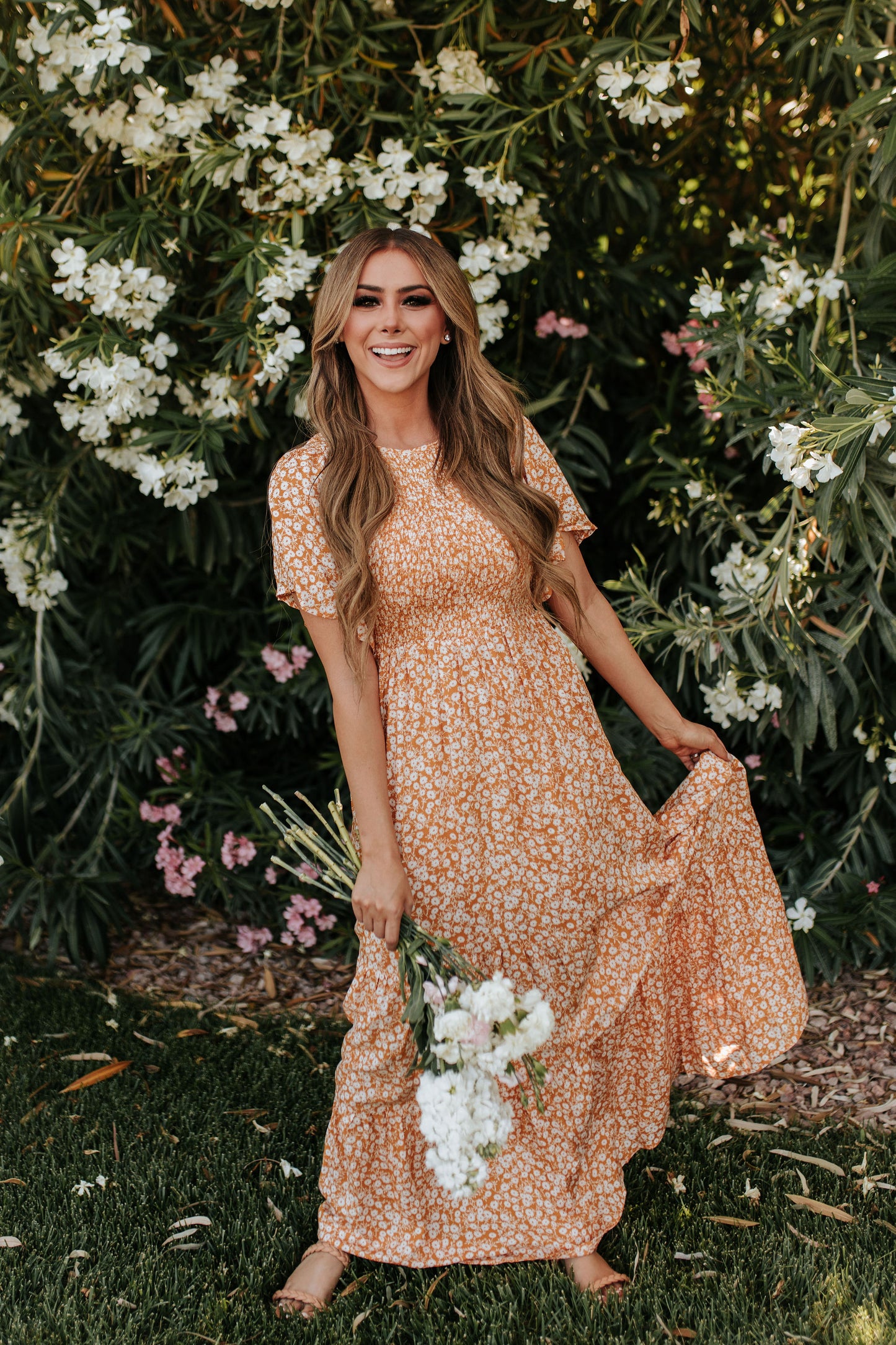 THE ESTELLE SMOCKED MAXI DRESS IN MARIGOLD