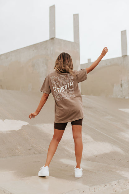 THE LET HER FLY TEE IN ESPRESSO BY PINK DESERT