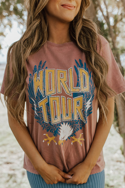 THE WORLD TOUR GRAPHIC TEE IN BRICK