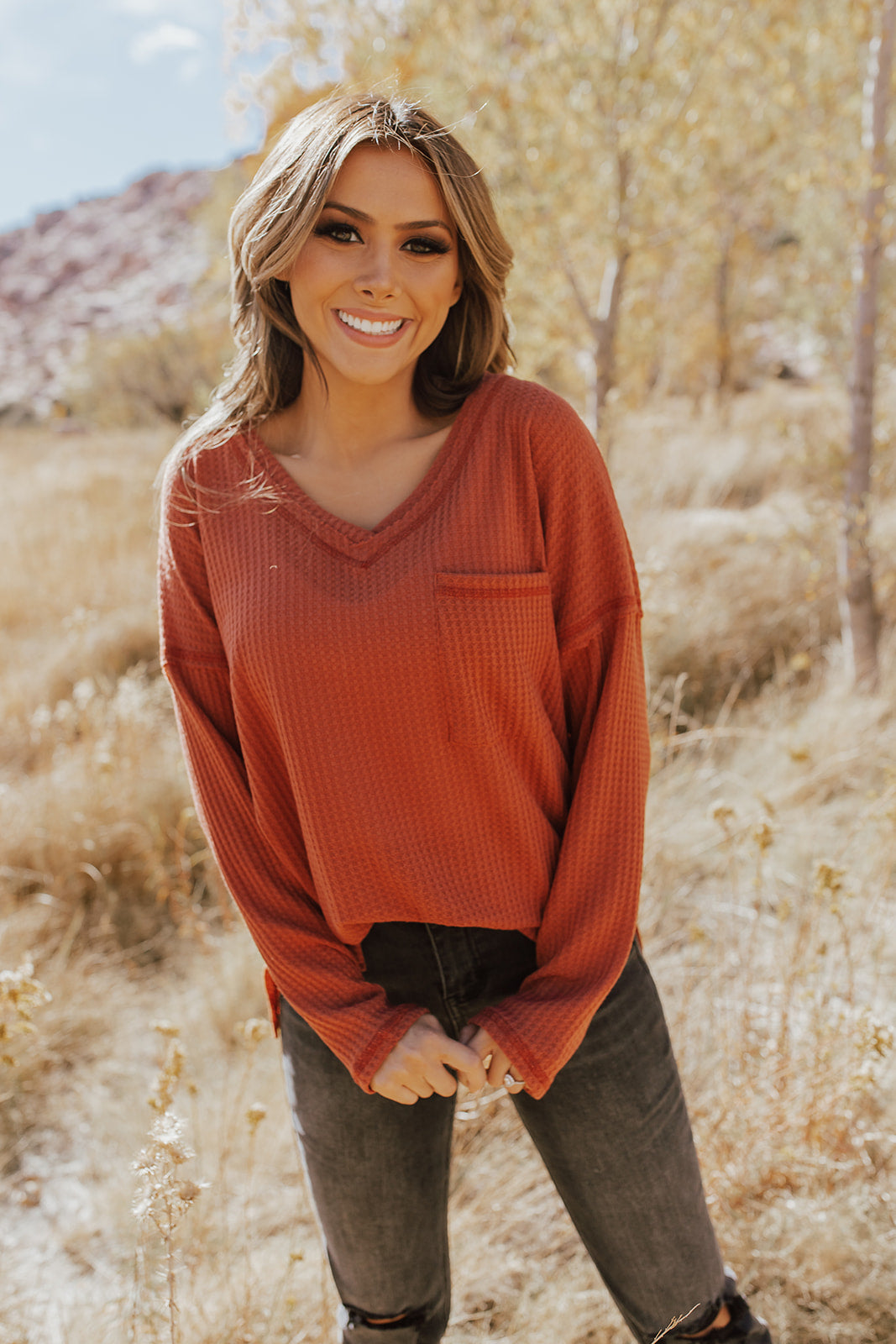 THE INSTANT REPLAY LONG SLEEVE TOP IN RUST