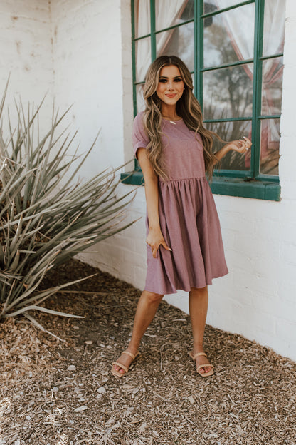 THE BODHI STRIPED BABYDOLL DRESS IN MAUVE