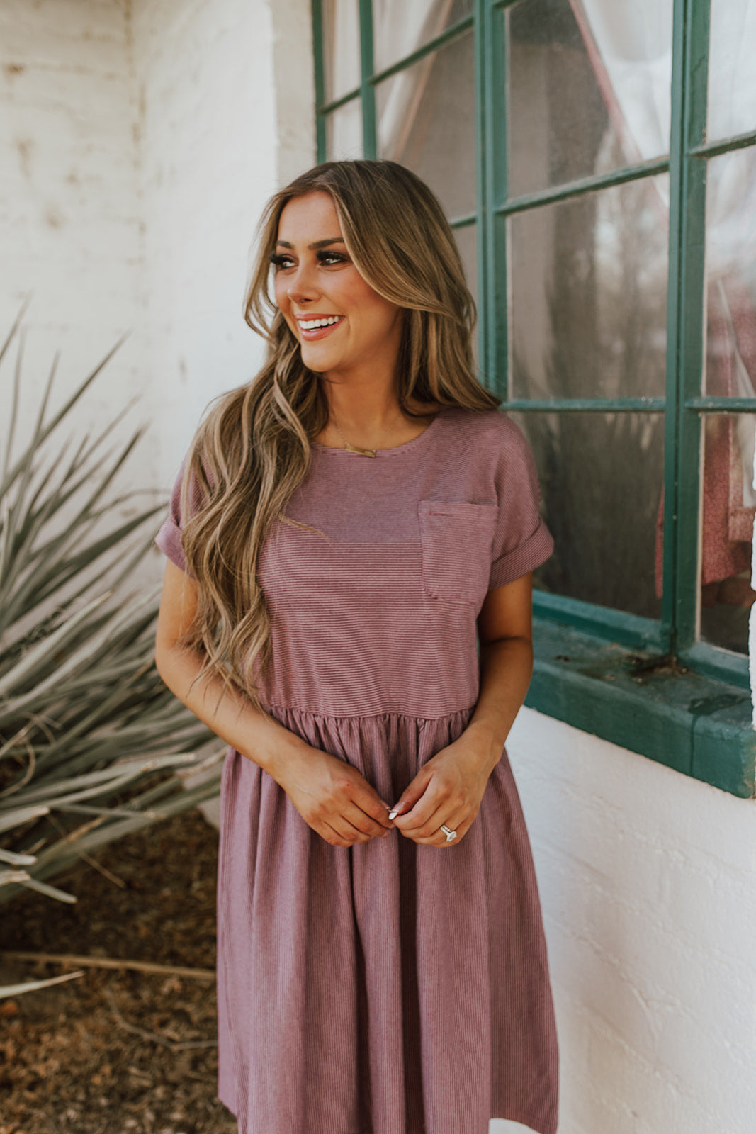 THE BODHI STRIPED BABYDOLL DRESS IN MAUVE