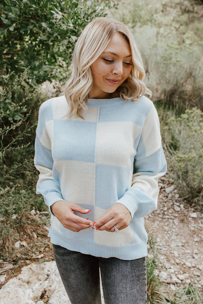 THE CLOUD NINE CHECKERED KNIT SWEATER IN SKY BLUE