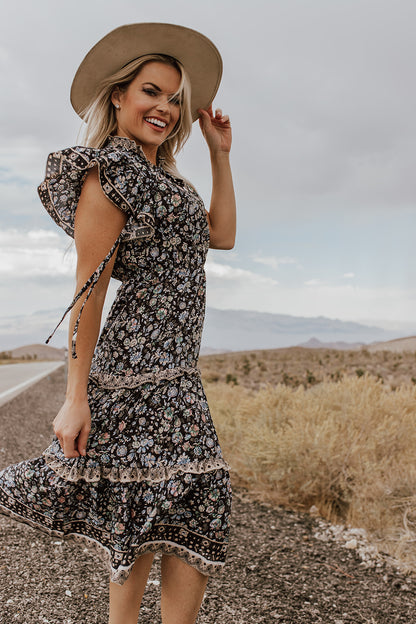 THE FLORENCE TIERED MIDI DRESS IN BLACK FLORAL