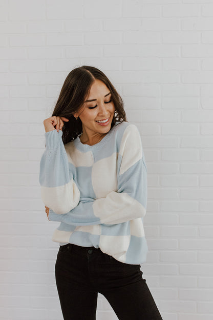 THE CLOUD NINE CHECKERED KNIT SWEATER IN SKY BLUE