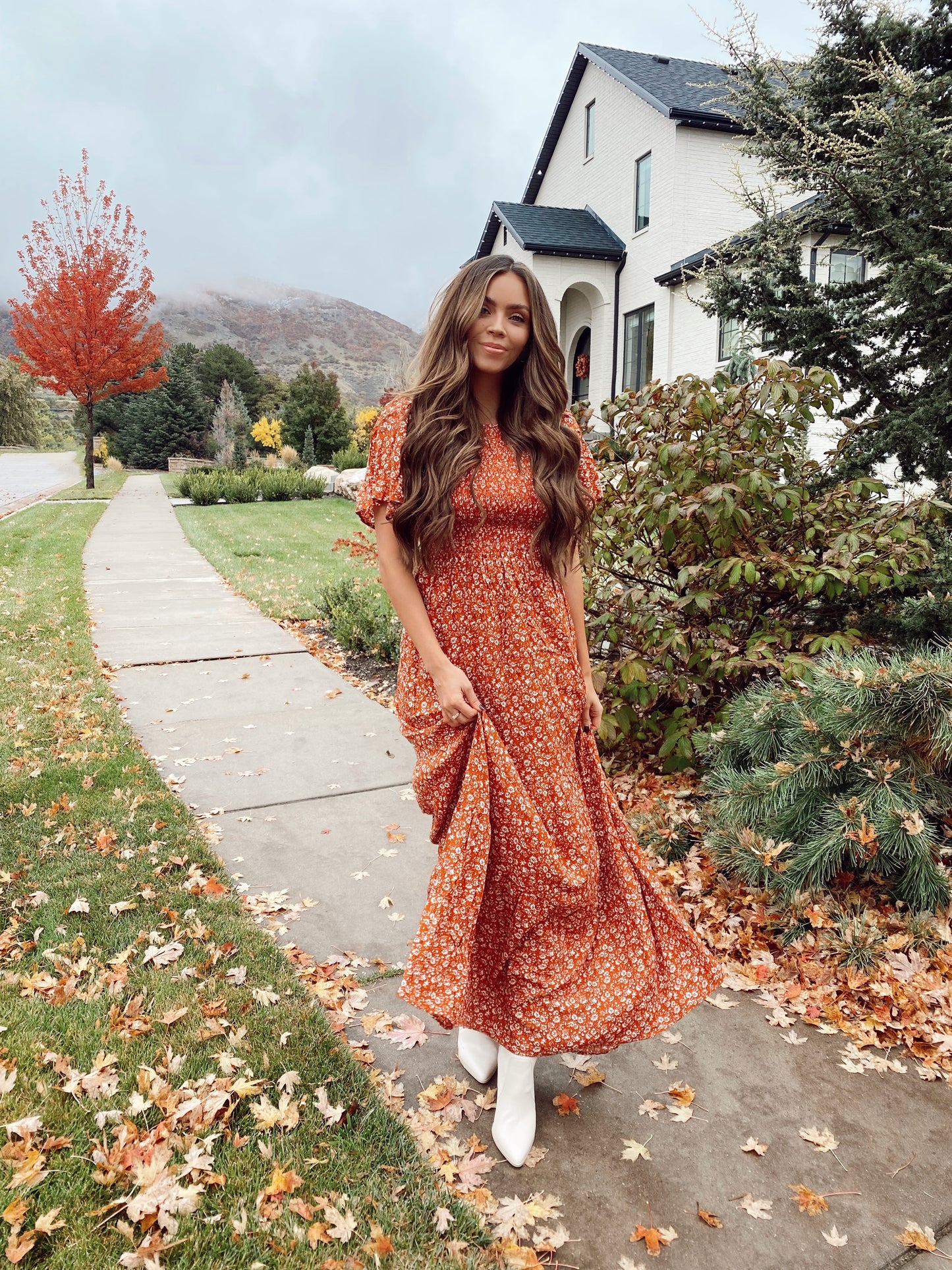 THE ESTELLE SMOCKED MAXI DRESS IN FLORAL RUST