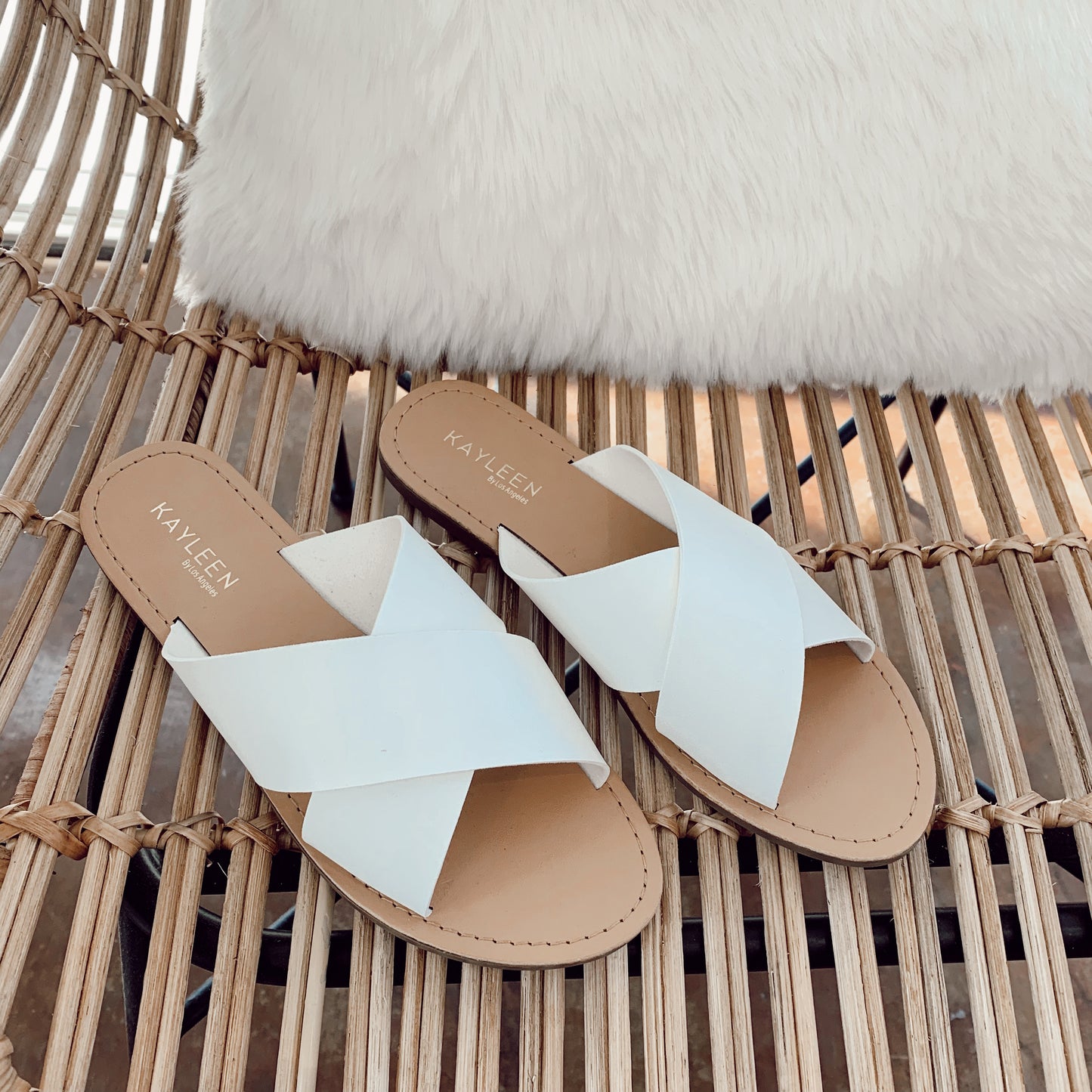 THE CRISS CROSS STRAPPY FLAT SANDAL IN WHITE